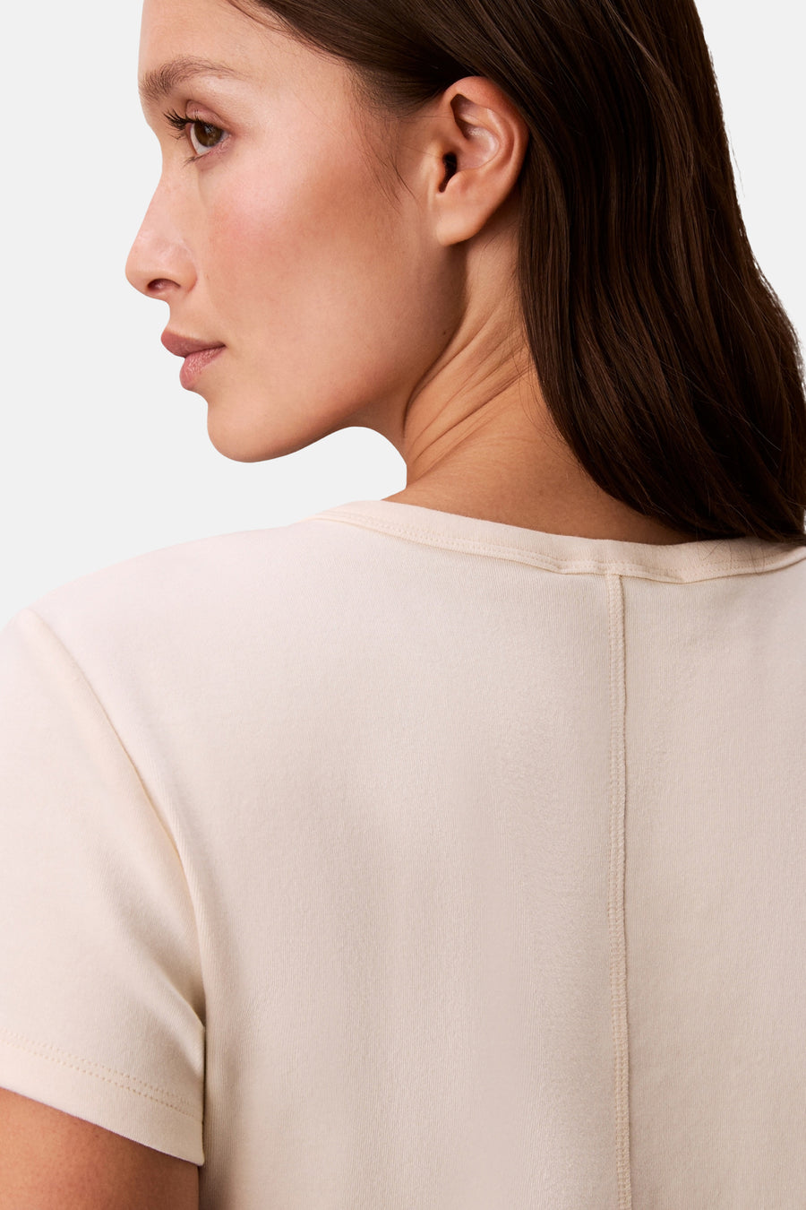 Gilet de couleur écru de Calvin Klein, montré de dos avec une couture verticale.