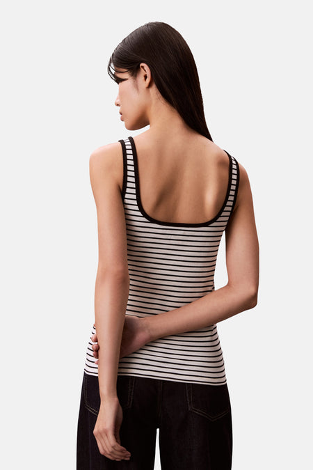 Débardeur rayé Calvin Klein, vu de dos, avec des rayures horizontales noires et blanches.