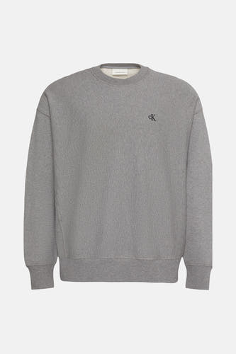 Grijze sweater van Calvin Klein Jeans, met klein, geborduurd logo op de borst.
