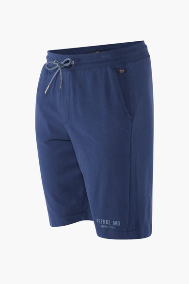 Short bleu de Petrol Industries avec cordon et le logo 'Petrol Ind. Hawaii-Aloha' en bas.