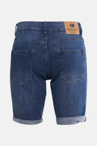 Jean court en denim bleu moyen de Petrol Industries, avec des poches arrière et un ourlet relevé.