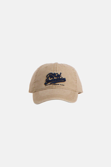 Beige pet van Petrol Industries met een geborduurd logo en een vintage wassing.
