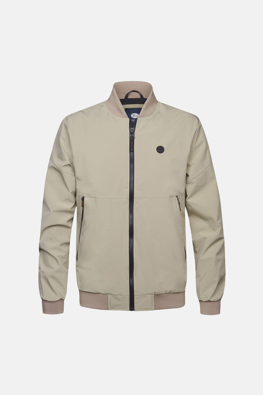 Beige korte jas van Petrol Industries®, met rits en ronde merkbadge op de borst.