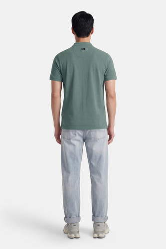 Polo verte de Petrol Industries, à manches courtes, à porter avec un jean et des baskets.