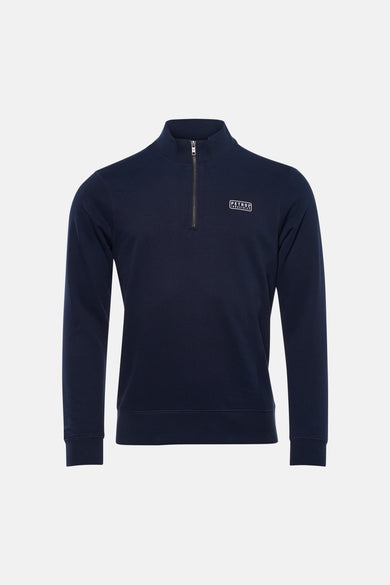 Pull bleu à col rond de Petrol Industries, avec une fermeture éclair courte et un logo sur la poitrine.