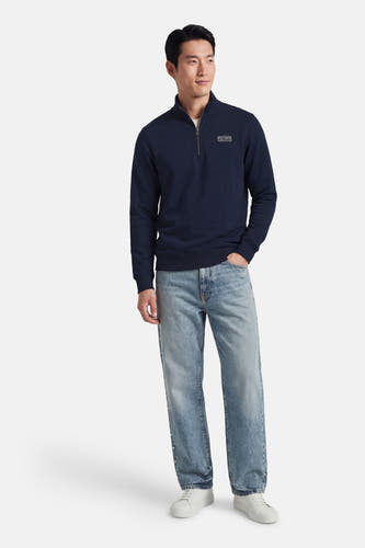 Blauwe sweater met ronde hals van Petrol Industries, met een halve rits en een logo op de borst.
