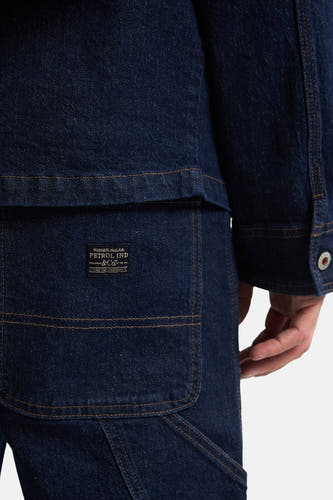 Blauwe jeansjas van Petrol Industries met zakdetail en knoopsluiting.

