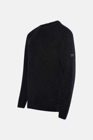 Gilet noir avec col rond de Petrol Industries, en tricots côlés et un petit étiquette sur la manche.