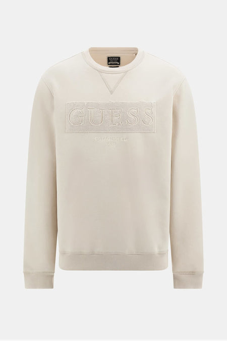 Ecru sweater met ronde hals van Guess, met ton-sur-ton geborduurd Guess-logo en geribbelde boorden.