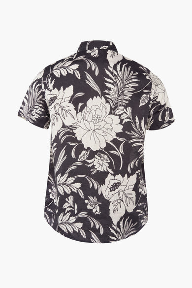 Chemise noire à manches courtes de Guess, avec un motif floral distinctif en tons blancs sur le dos.