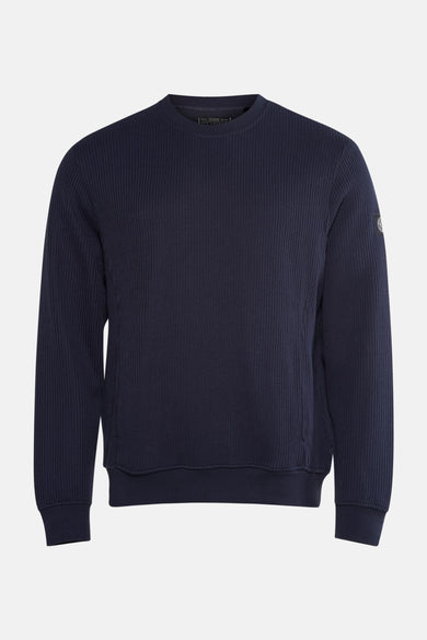 T-shirt bleu avec col rond de Guess, doté d'un fin motif côtelé.
