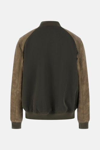 Donkergroen bomberjack met suède mouwen.