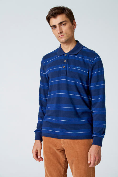 T-shirt à rayures bleues avec longues manches de Le Fabuleux Marcel de Bruxelles, avec des boutons bruns et une inscription logo.