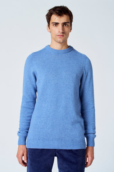 Blauwe trui met ronde hals van Le Fabuleux Marcel de Bruxelles, met ribgebreide boorden en lange mouwen.