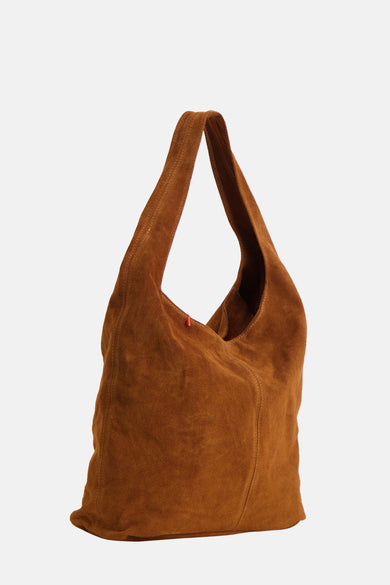 Sac à main brun de Le Fabuleux Marcel de Bruxelles, avec une texture en suède et quelques points visibles.