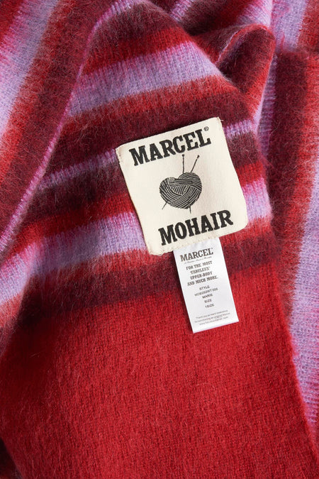 Multikleurige wintersjaal van mohair van Le Fabuleux Marcel de Bruxelles, met een gestreept patroon en zachte textuur.
