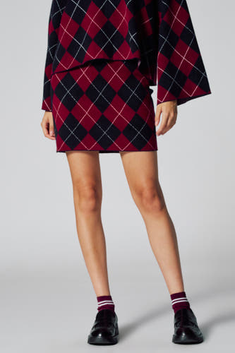 Korte rok in multicolor van Le Fabuleux Marcel de Bruxelles, met argyle ruitpatroon in rood, zwart en wit.