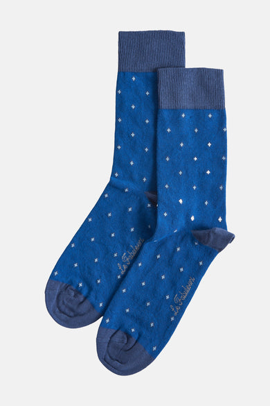 Chaussettes bleues de Le Fabuleux Marcel de Bruxelles avec un motif fin de violette et des détails bleu marine.