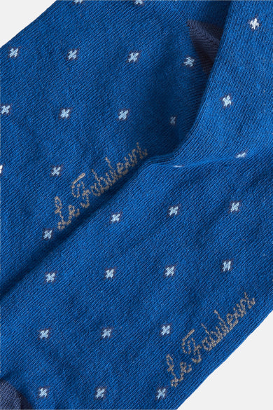 Chaussettes bleues de Le Fabuleux Marcel de Bruxelles avec un motif à carreaux et la marque.
