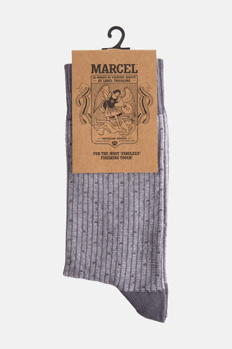 Grijze sokken van Le Fabuleux Marcel de Bruxelles, met een subtiel stippenpatroon en ribstructuur.

