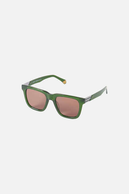 Groene zonnebril van Le Fabuleux Marcel de Bruxelles, met bruine glazen en een zilverkleurig detail op de veren.