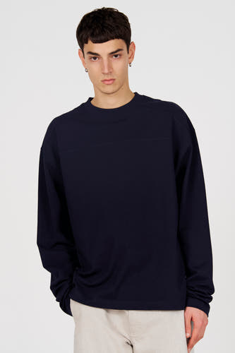Pull bleu à col rond de Le Fabuleux Marcel de Bruxelles, avec manches longues et un design uni.