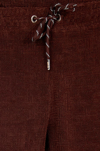 Short marron de Le Fabuleux Marcel de Bruxelles, avec cordon de serrage et détails argentés.