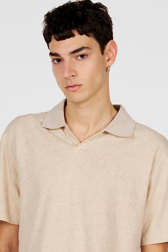 Polo grise de Le Fabuleux Marcel de Bruxelles, à manches courtes et petit logo brodé.