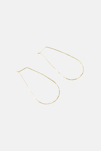 Gouden oorringen van Le Fabuleux Marcel de Bruxelles met een minimalistisch, druppelvormig ontwerp.
