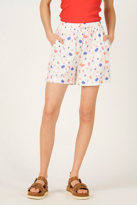 Multikleurige korte broek van Le Fabuleux Marcel de Bruxelles, met een zomerse print van strandaccessoires.