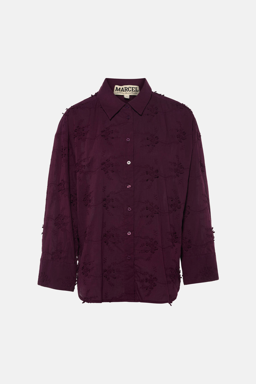 Chemise violette à manches longues de Le Fabuleux Marcel de Bruxelles, avec motif floral brodé.