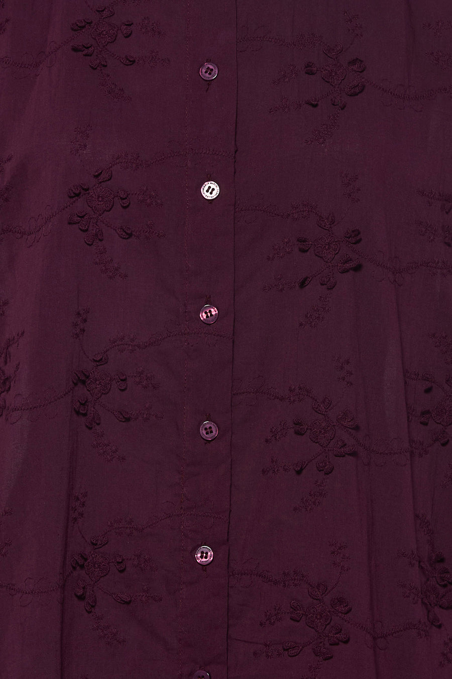 Chemise violette de Le Fabuleux Marcel de Bruxelles avec motifs floraux délicatement brodés et boutons avec logo de la marque.
