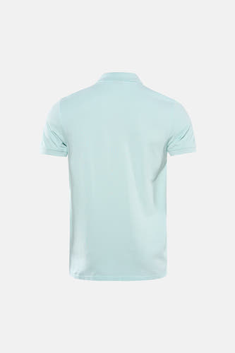 Groene polo met korte mouwen van Petrol Industries, effen ontwerp op een egale achtergrond.