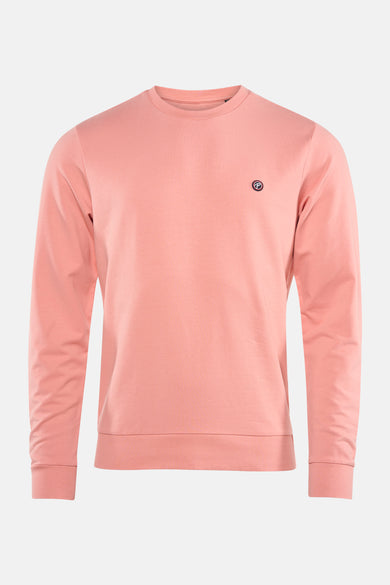 Gilet rose de Petrol Industries® avec des manches longues et un petit logo sur la poitrine.