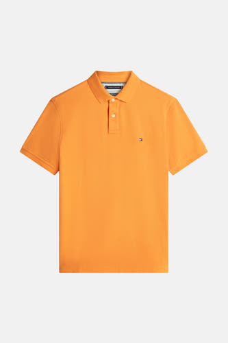 Oranje polo met korte mouwen van Tommy Hilfiger, met een subtiel logo op de borst.