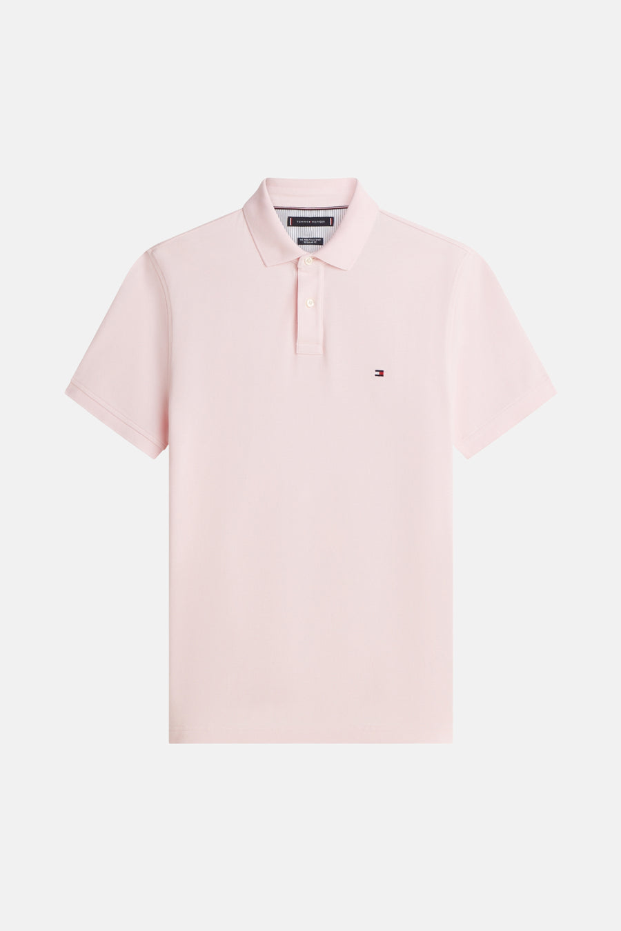 Roze polo met korte mouwen van TOMMY HILFIGER, met een klein geborduurd logo op de borst.