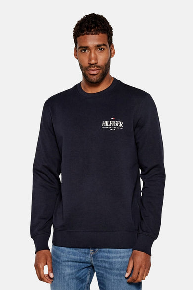 Blauwe sweater met ronde hals van TOMMY HILFIGER, met logo op de borst en geribde boorden.