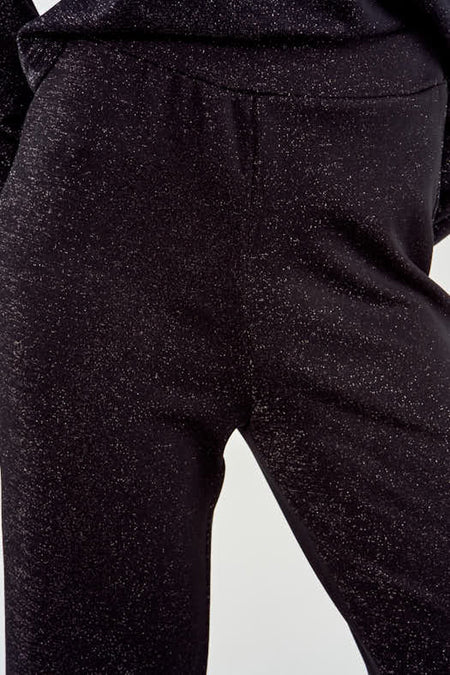 Zwarte broek van NOOR BY NORA GHARIB, met glitters, comfortabele pasvorm.

