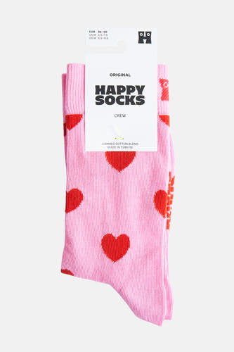 Roze sokken van Happy Socks met rode hartenprint.
