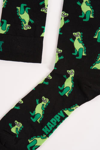 Zwarte sokken van Happy Socks, met een groen dinosauruspatroon en het woord "HAPPY" erop gedrukt.