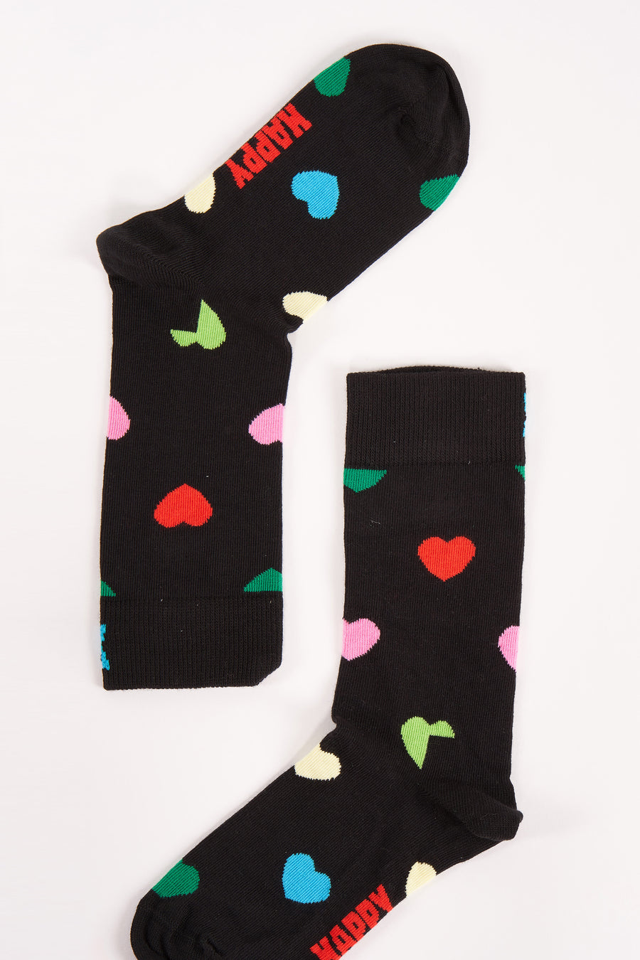 Zwarte sokken van Happy Socks, versierd met kleurrijke hartjes.