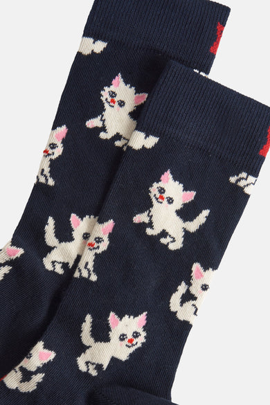 Blauwe sokken van Happy Socks® met een leuk patroon van witte katjes met roze accenten.