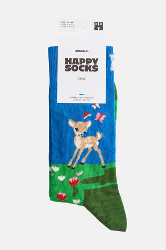 Chaussettes multicolores de Happy Socks, avec un dessin d'un petit cerf dans un environnement vert.