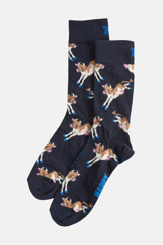Chaussettes bleues de Happy Socks® avec un motif de vaches en blanc et brun.