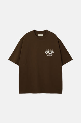 Bruin T-shirt met korte mouwen van ANOTHER COTTON LAB, met witte tekstprint op de borst.
