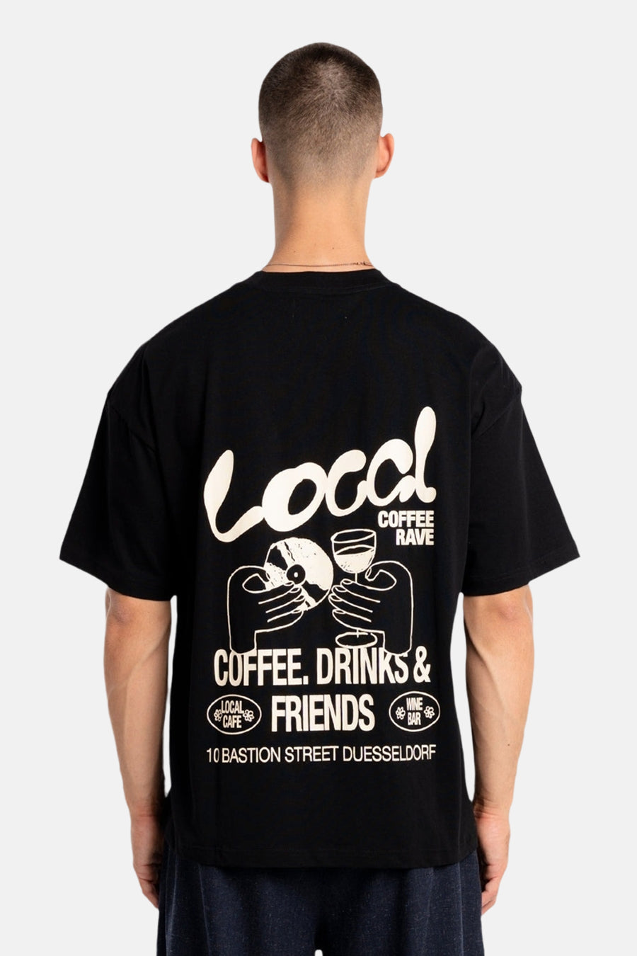Zwart T-shirt met korte mouwen van ANOTHER COTTON LAB met een grafische print op de achterkant.