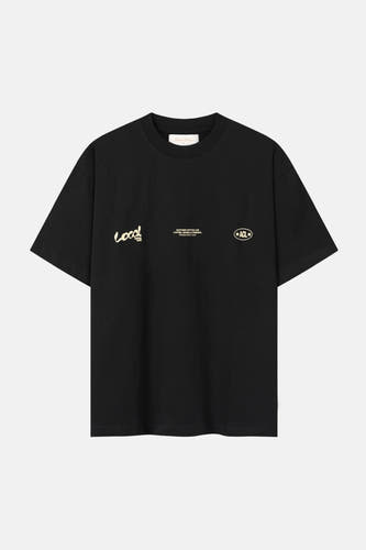 Zwart T-shirt met korte mouwen van ANOTHER COTTON LAB, met gouden tekst op de borst.
