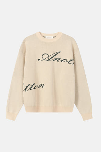 Beige trui met ronde hals van Another Cotton Lab, met een decoratieve tekstprint.