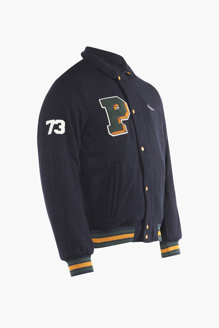 Blauw jack van Pepe Jeans met gele knopen, geribbelde manchetten en nummer "73" op de mouw.
