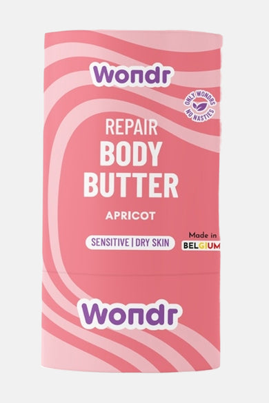 Roze body butter voor de gevoelige en droge huid van Wondr, met decoratieve golvende lijnen.
